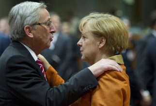 Jean-Claude Juncker, președintele Comisiei Europene, și Angela Merkel, cancelarul Germaniei